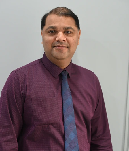 Dr. Tijo George